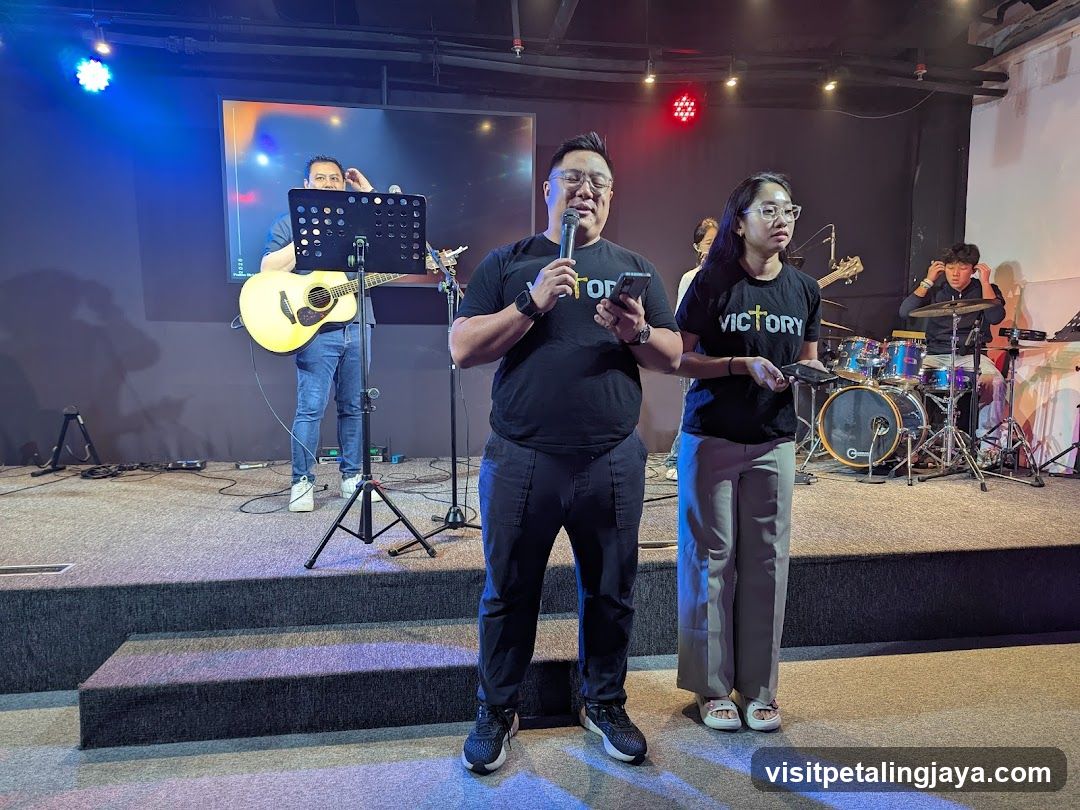 People on stage with musical instruments