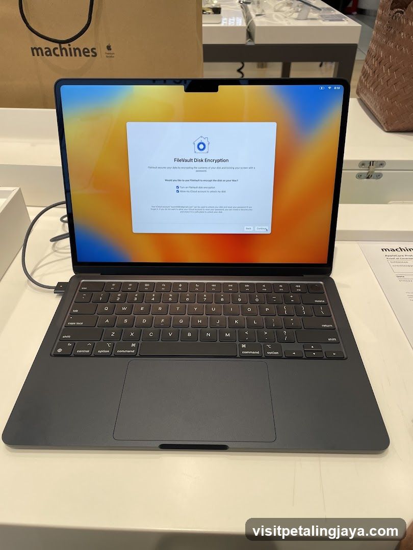 MacBook with FileVault Encryption Prompt