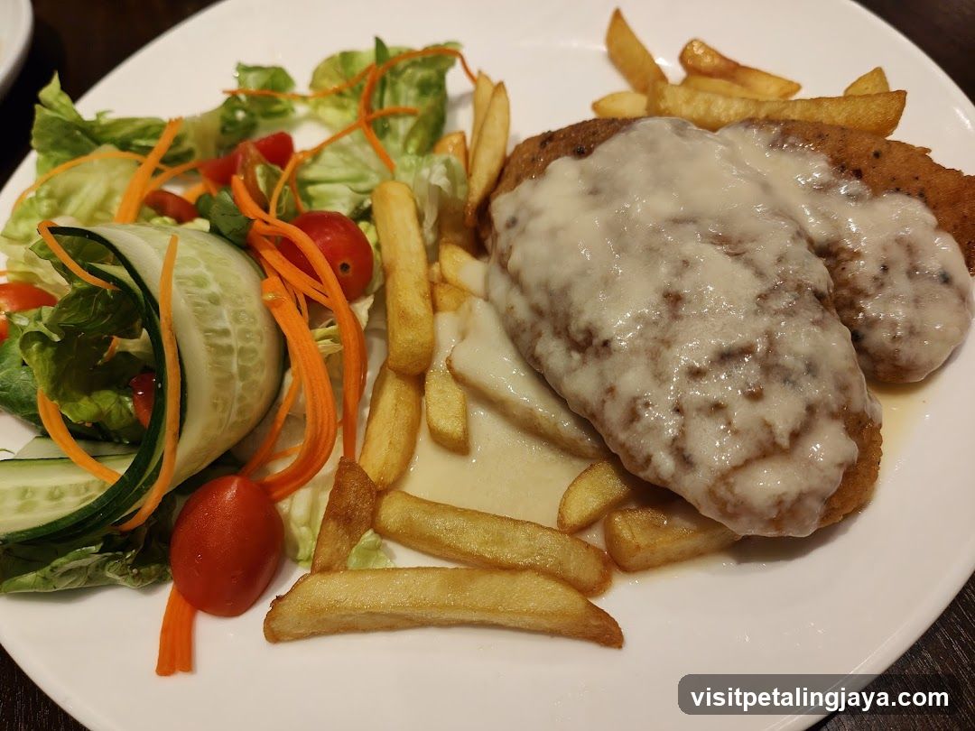 Breaded cutlets with cheese and fries