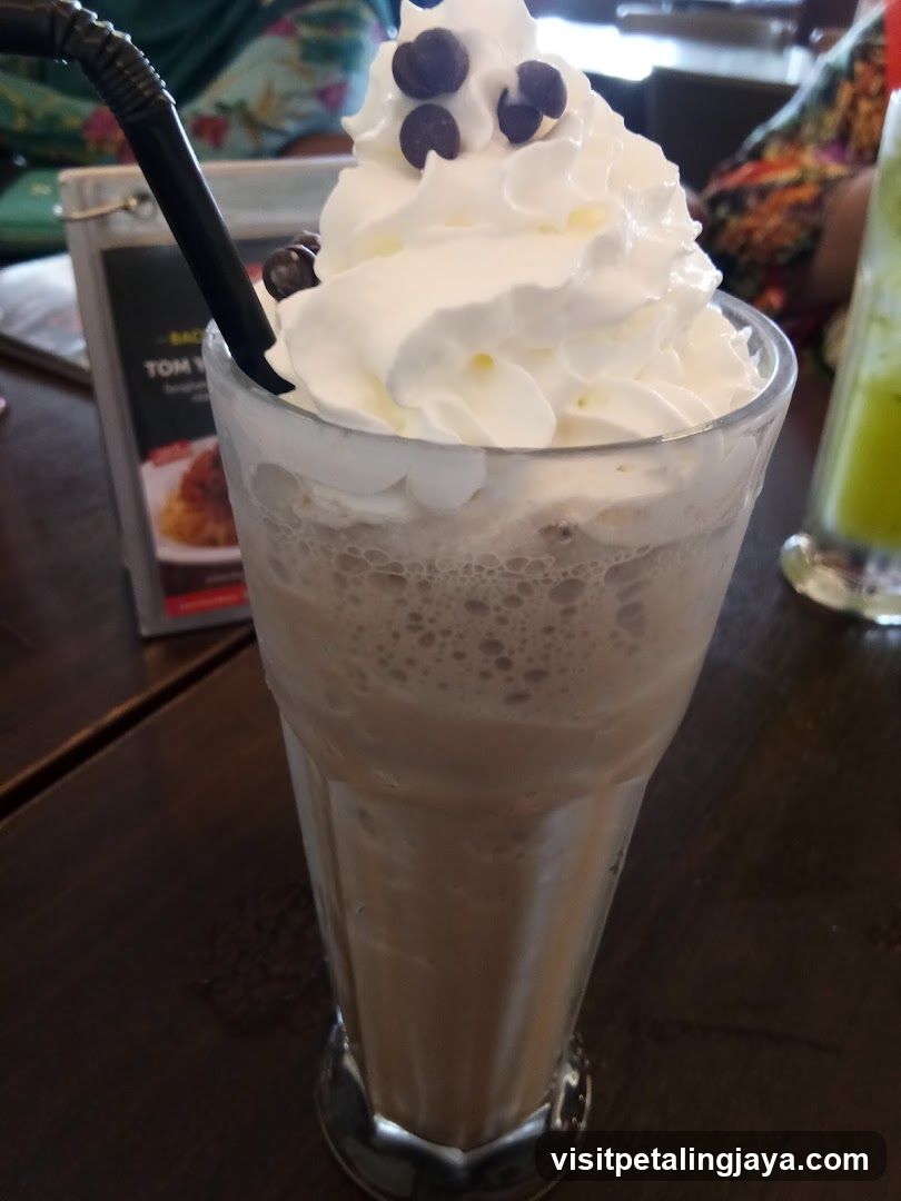 Iced Coffee with Whipped Cream and Chocolate Chips