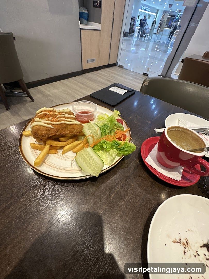 Fried Fish and Chips with Salad and Coffee