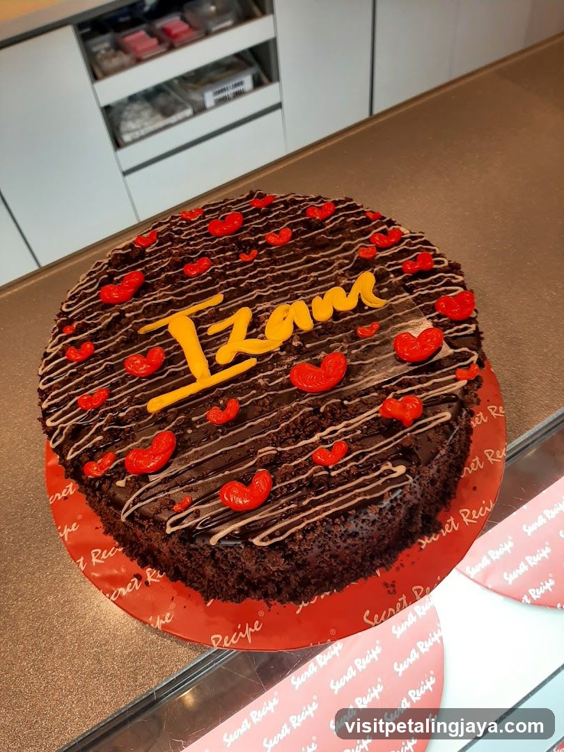 Chocolate Cake with "Izam" Written on Top