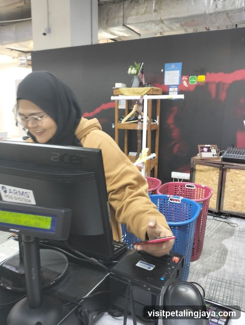 Cashier at POS System