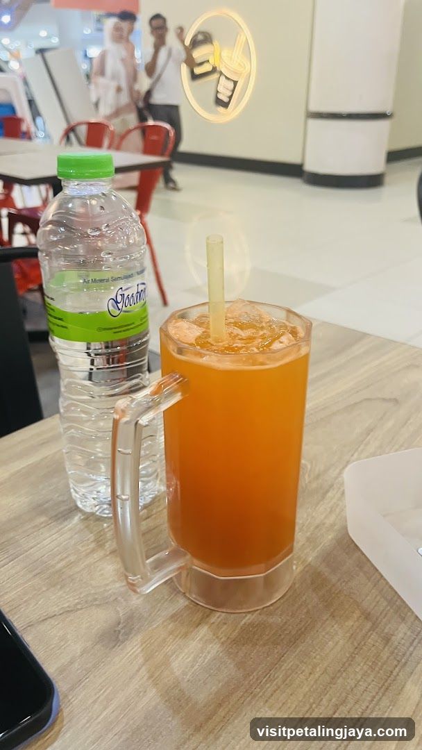Orange Drink and Water Bottle