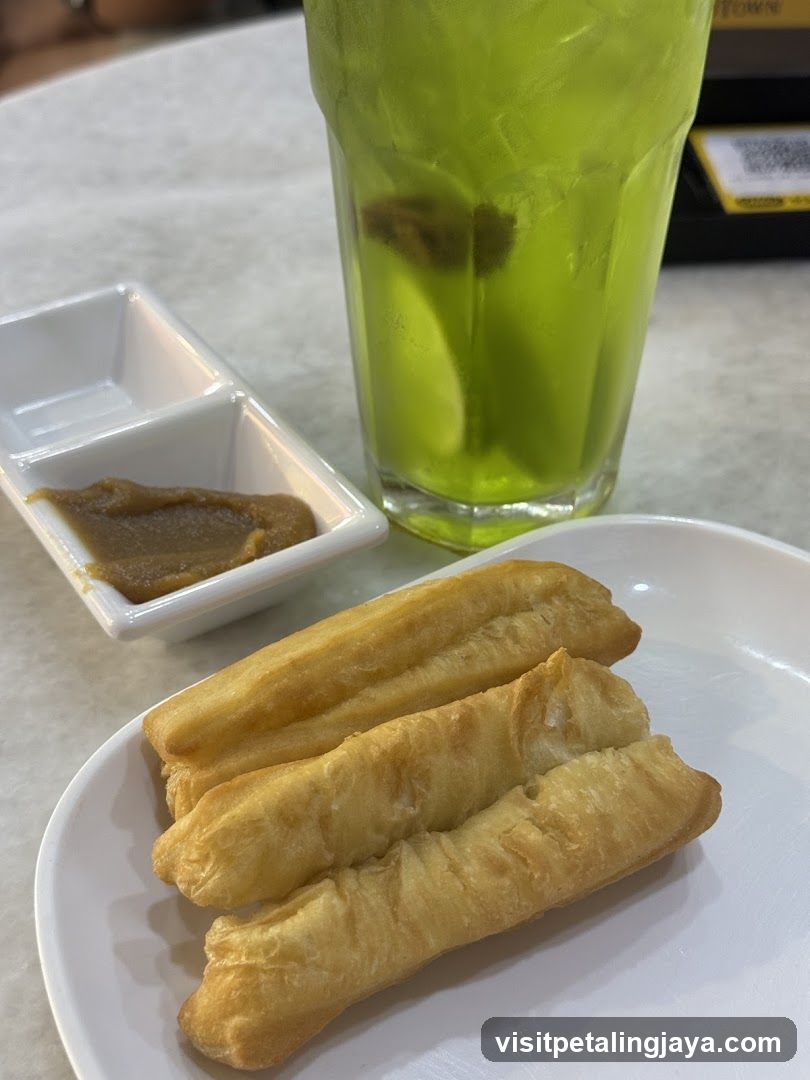 Fried Dough Sticks with Dip and Green Drink