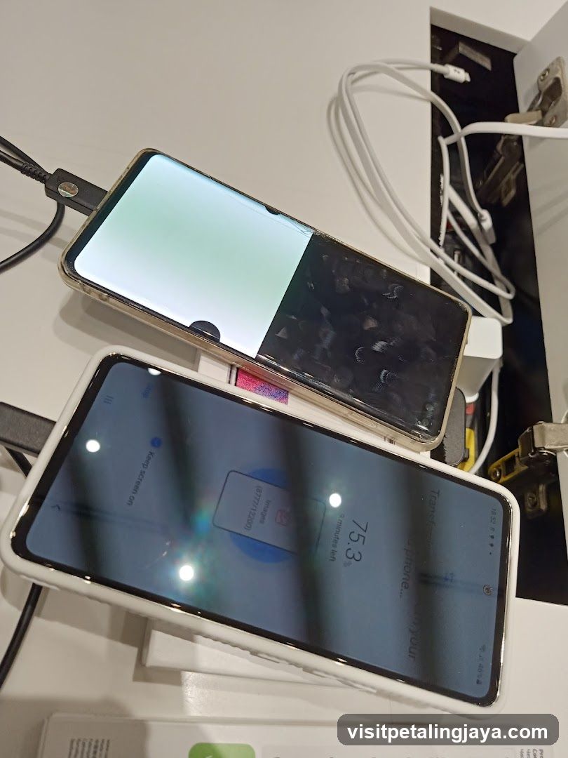 Two smartphones being charged