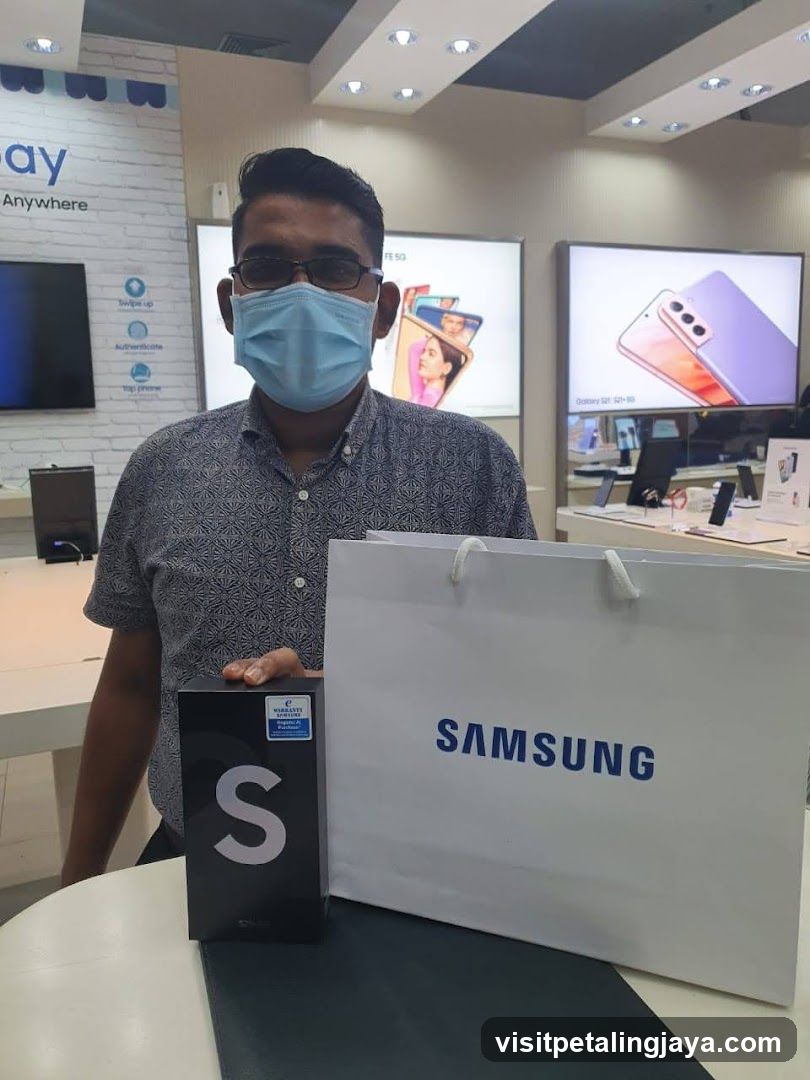 Man holding Samsung product