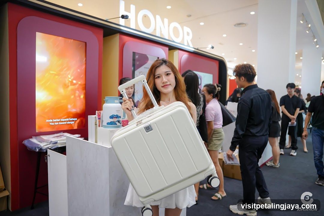 Woman holding a suitcase at a store