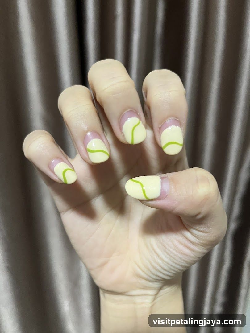 Yellow and Green Swirl Nails
