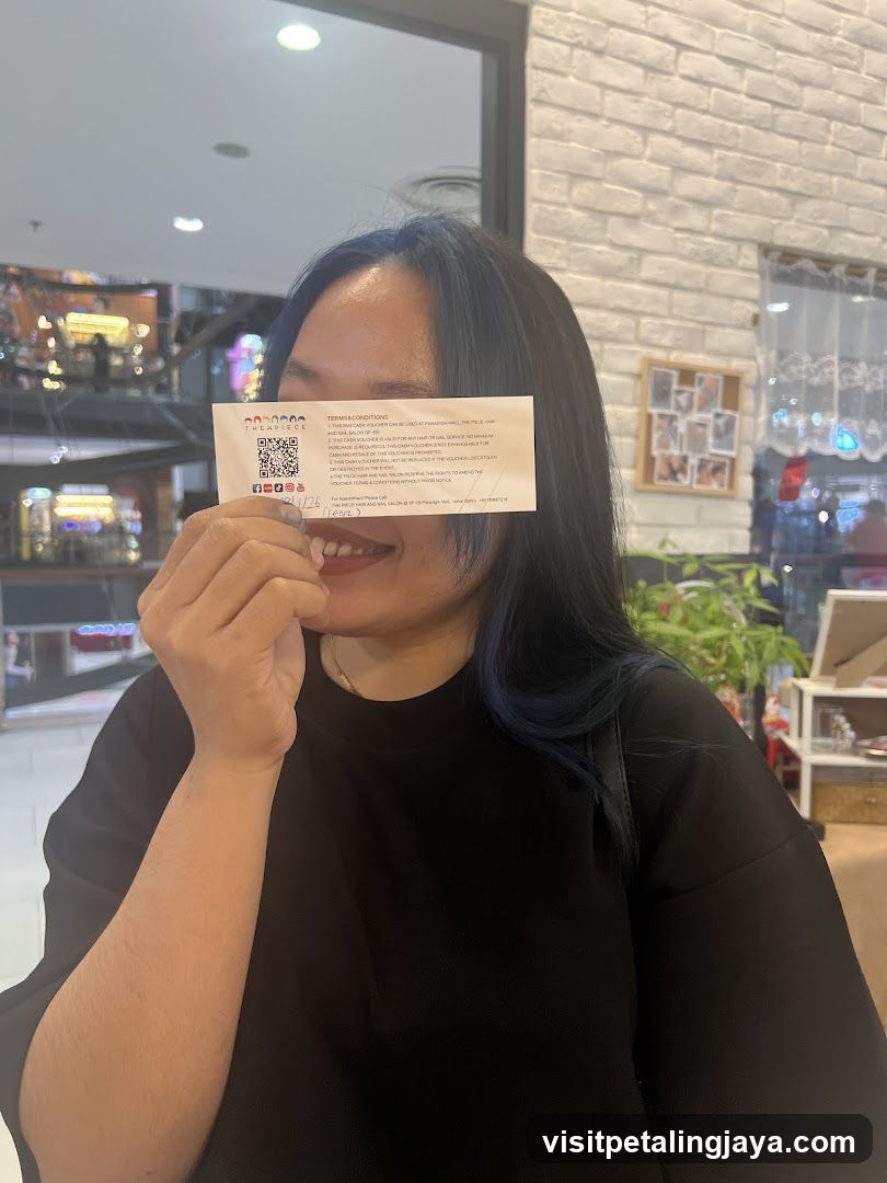 Woman Holding a Voucher