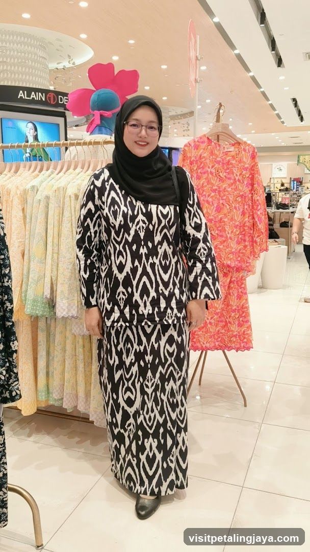 Woman in patterned attire in a clothing store