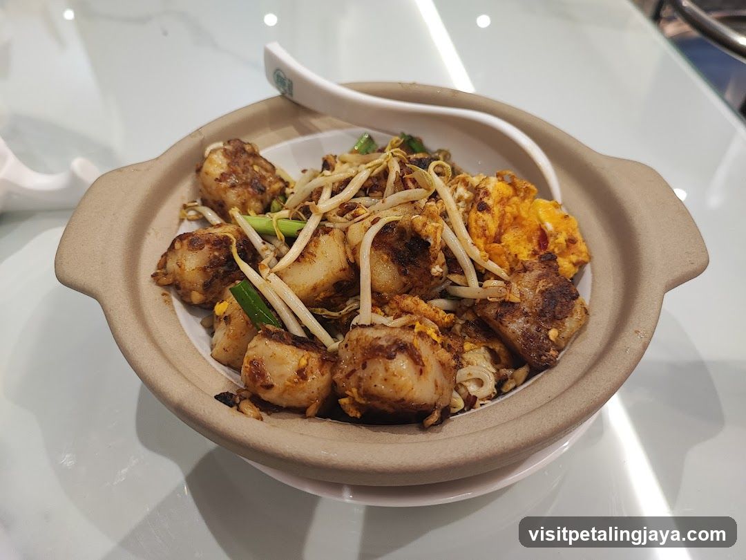 Fried Turnip Cake with Bean Sprouts and Scrambled Egg