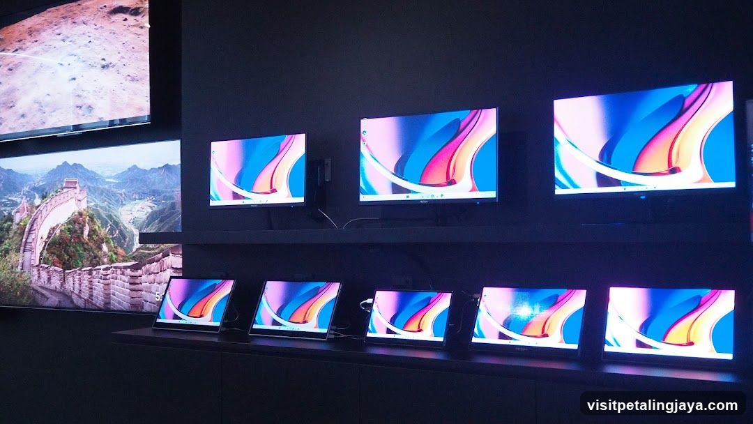 Computer Monitors Displaying Abstract Art
