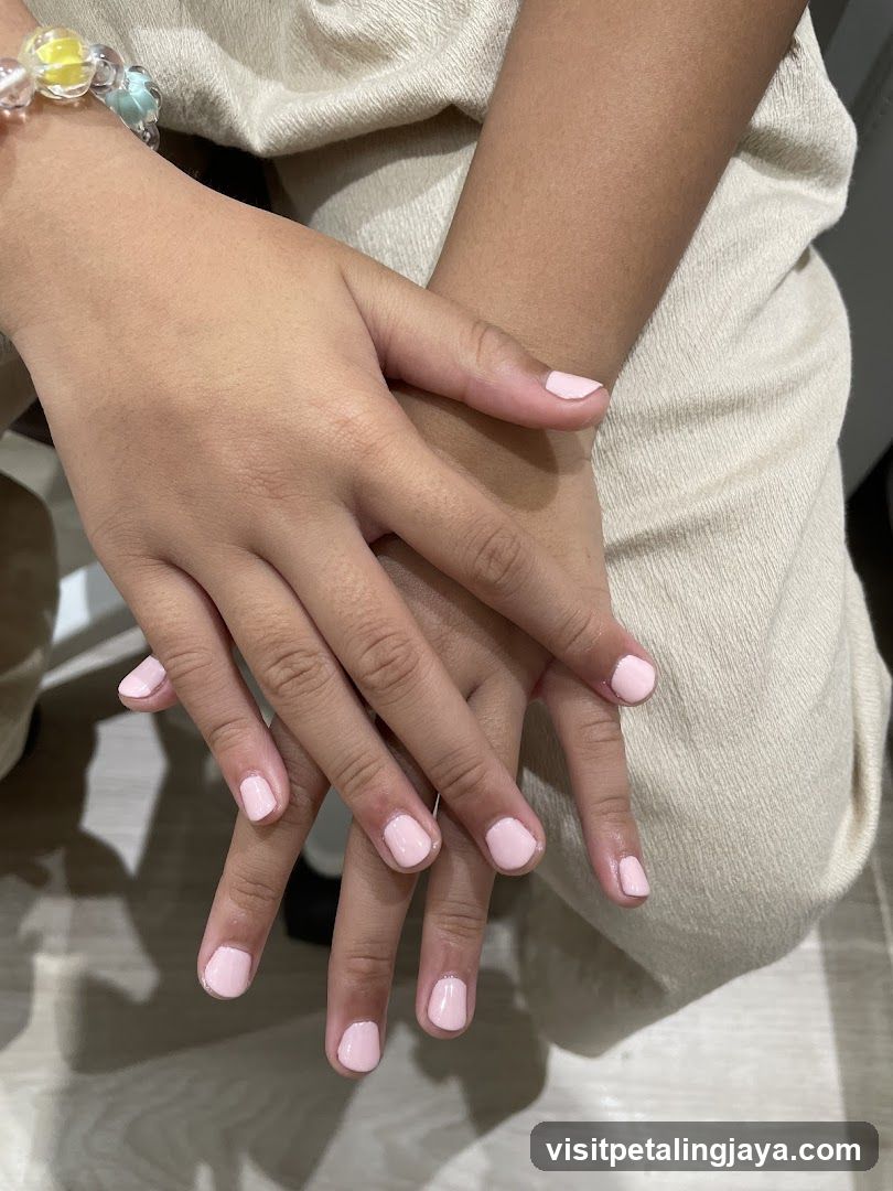Hands with Pink Nail Polish