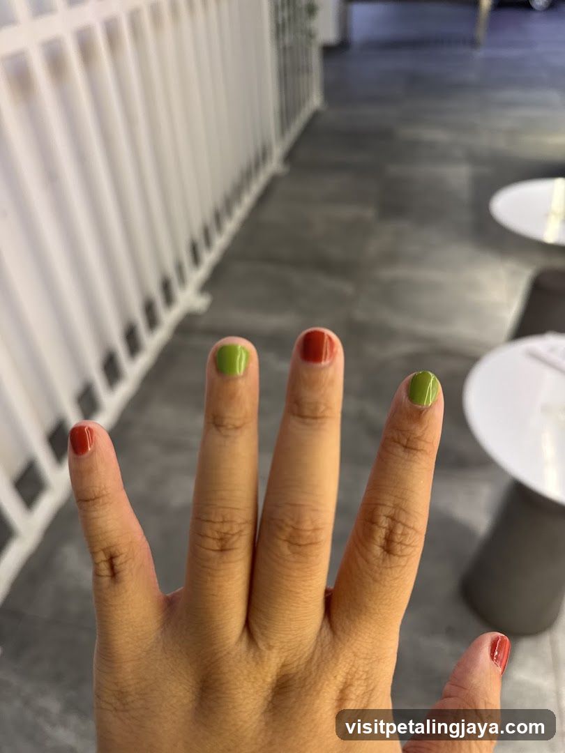 Hand with painted nails