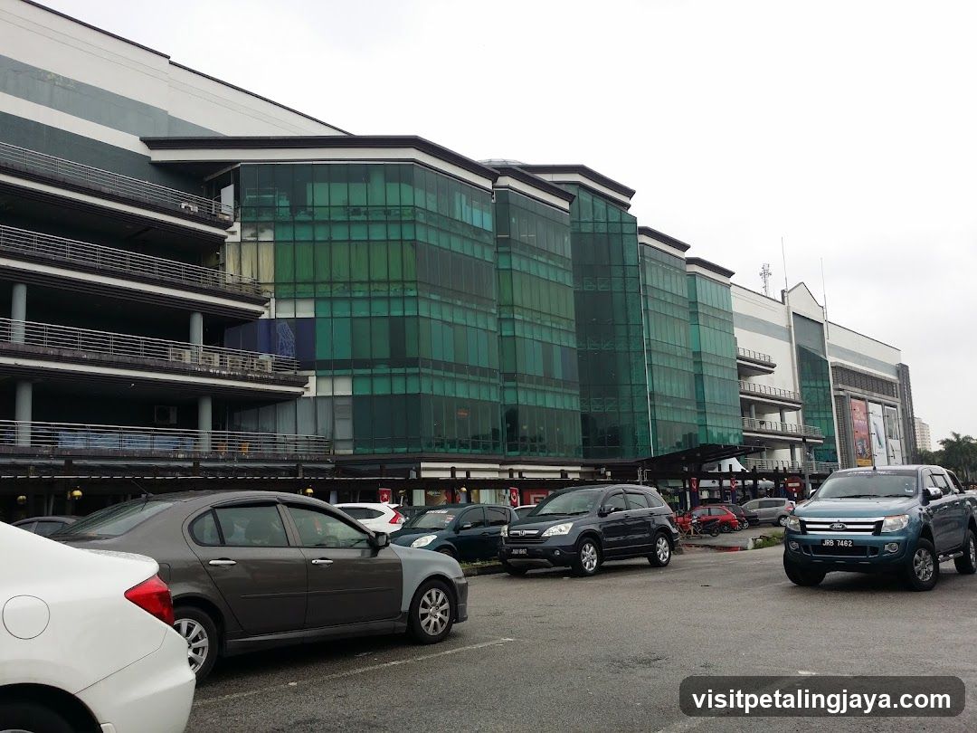 Modern Building Facade with Parking Lot