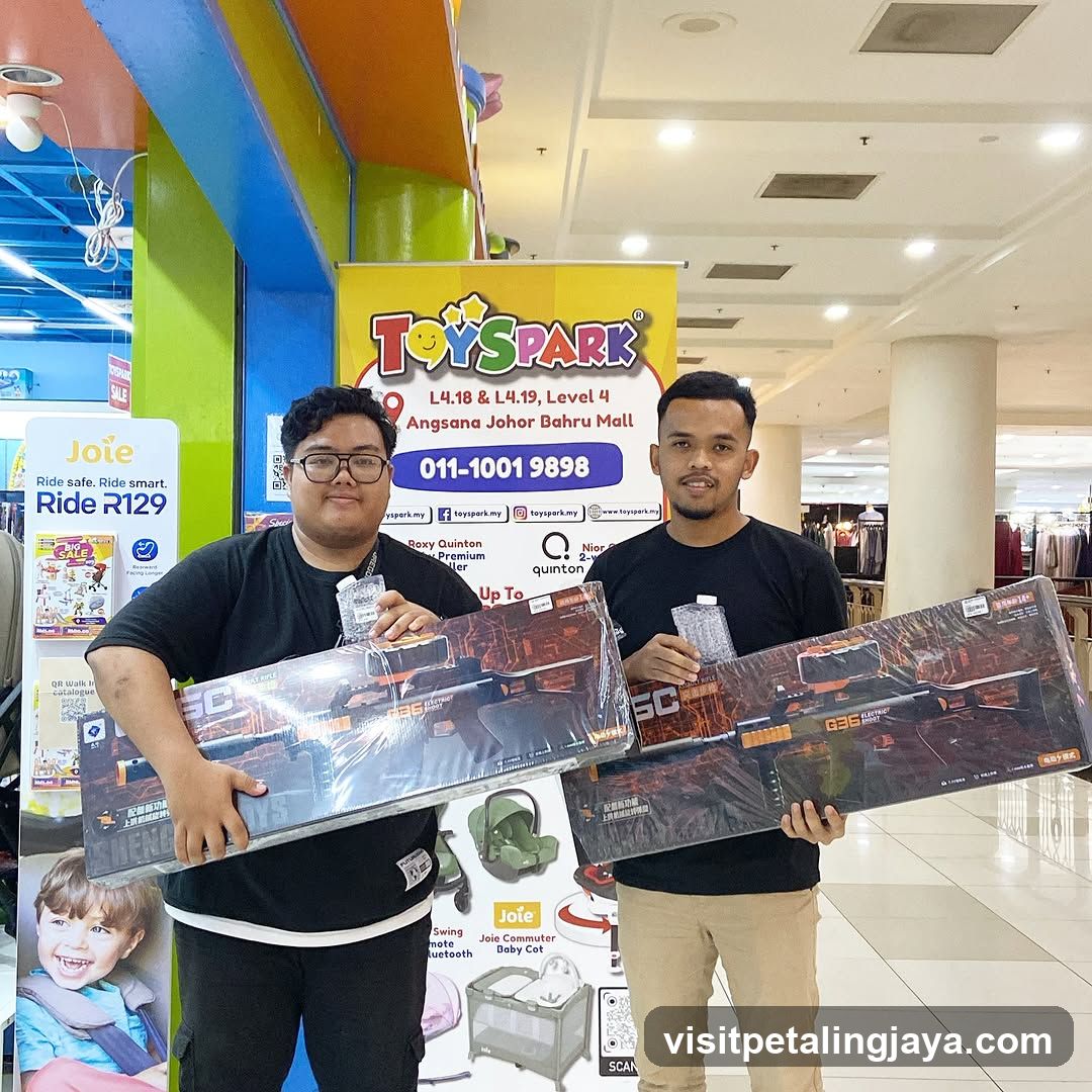 Two men holding toy guns