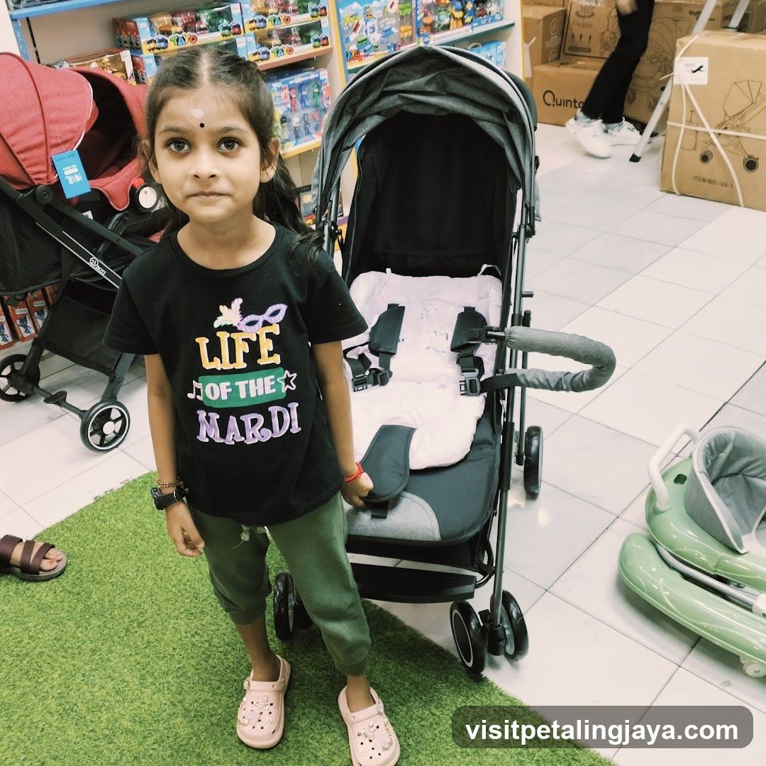 Young girl in a store with strollers