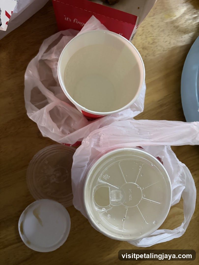 Two drinks in plastic bags