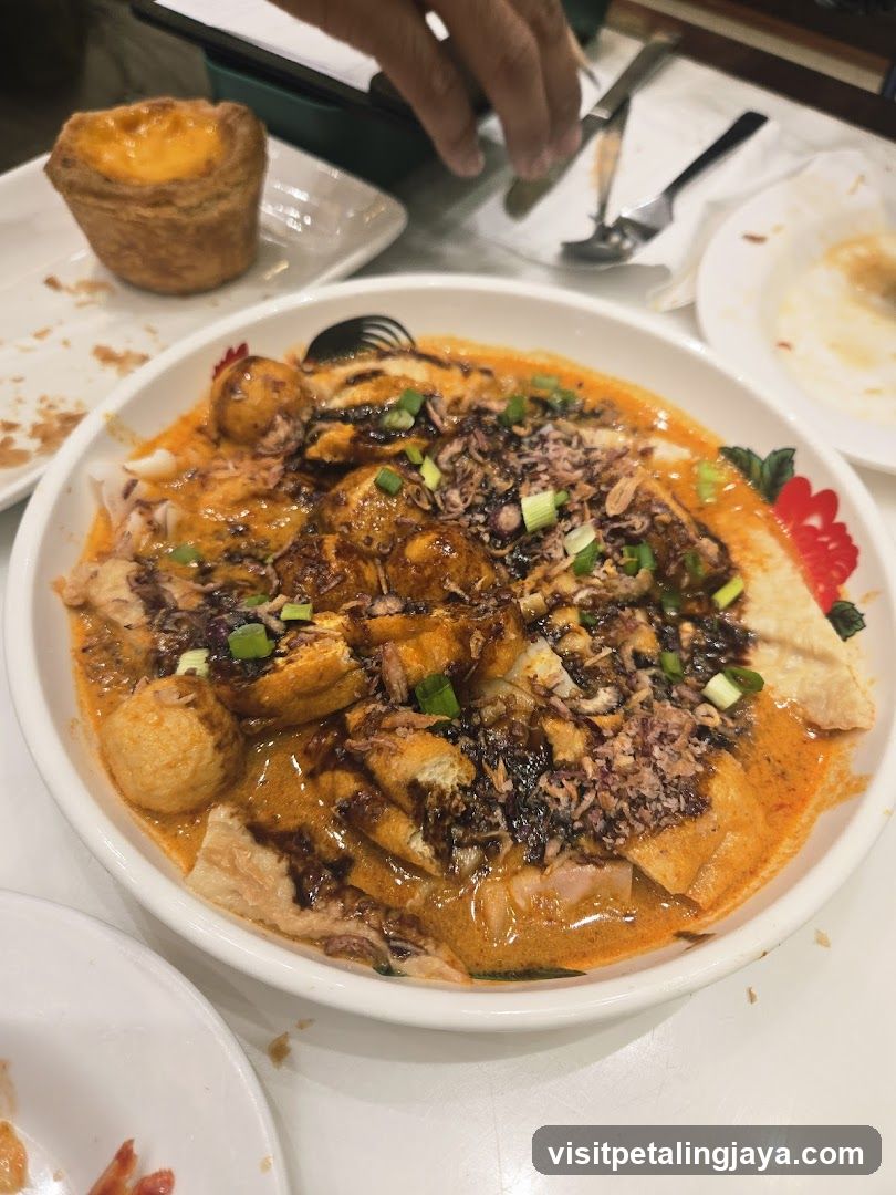 Noodle Dish and Egg Tart