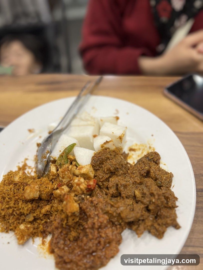 Plate of Food with People in Background
