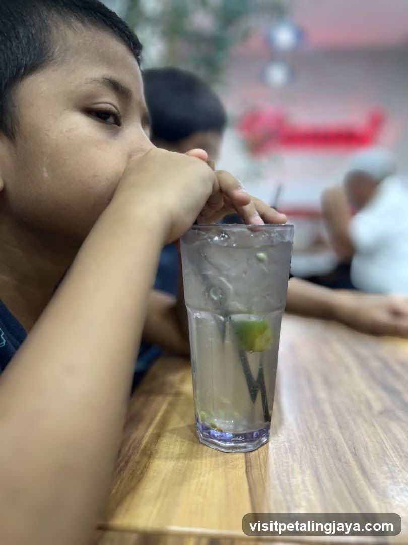 Boy drinking from a glass