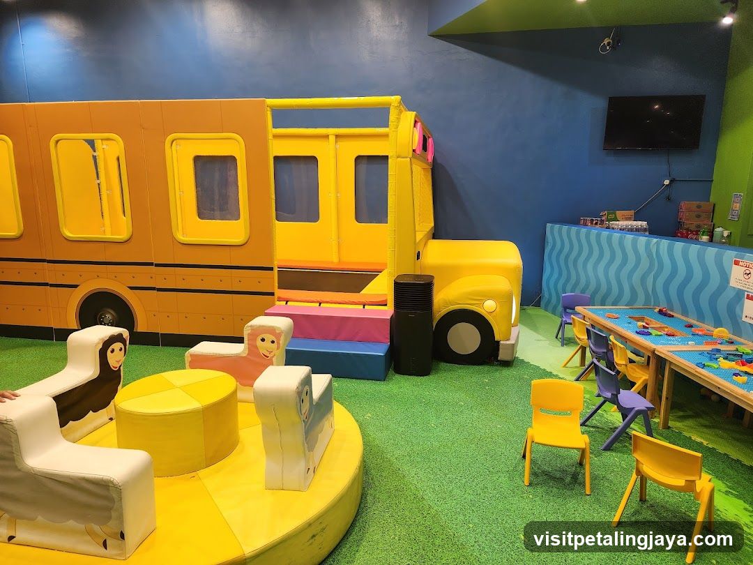 Children's Play Area with Themed Bus Structure