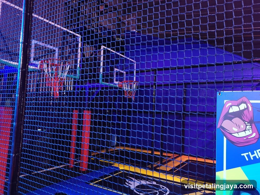 Indoor Trampoline Park with Basketball Hoops
