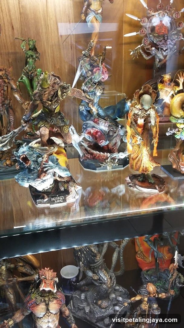 Display of figurines in glass case