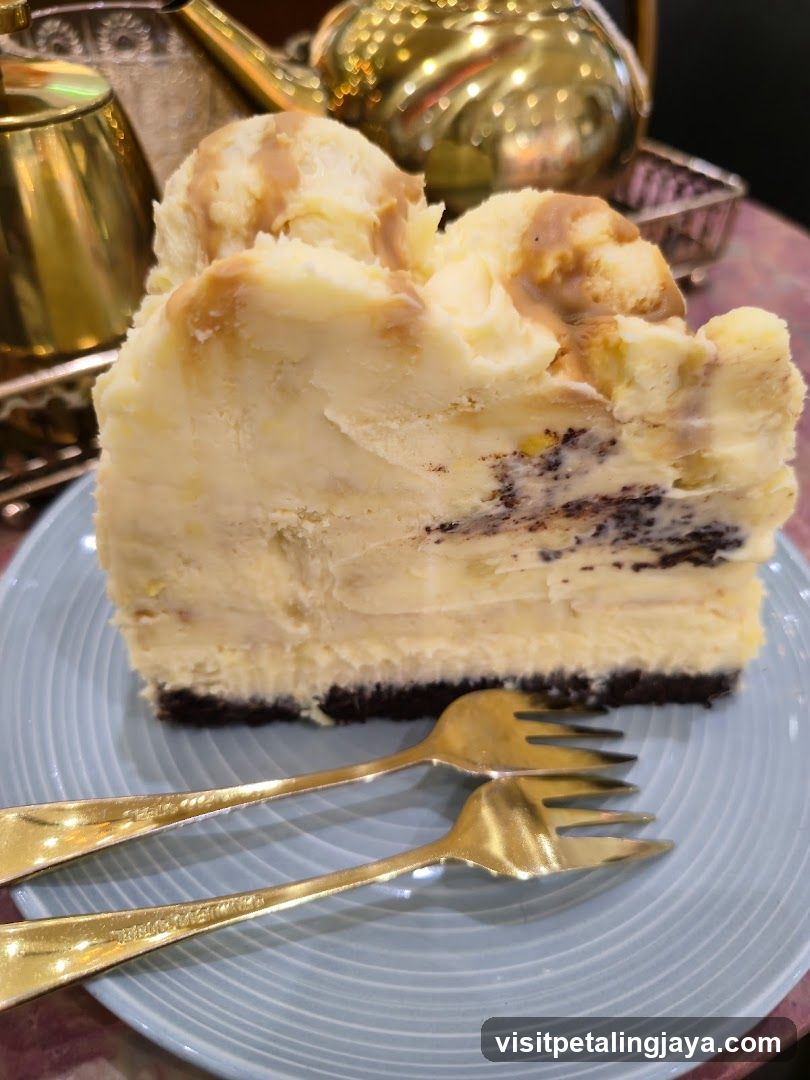 Cheesecake Slice with Forks and Teapot