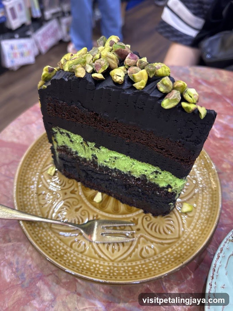 Chocolate and Pistachio Cake Slice