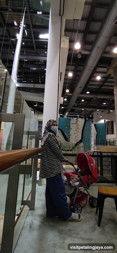 Interior of a multi-level facility with climbing walls