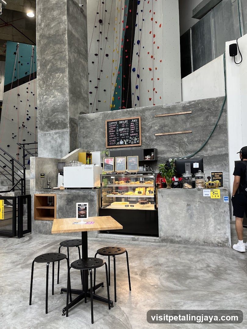 Indoor café area with climbing walls