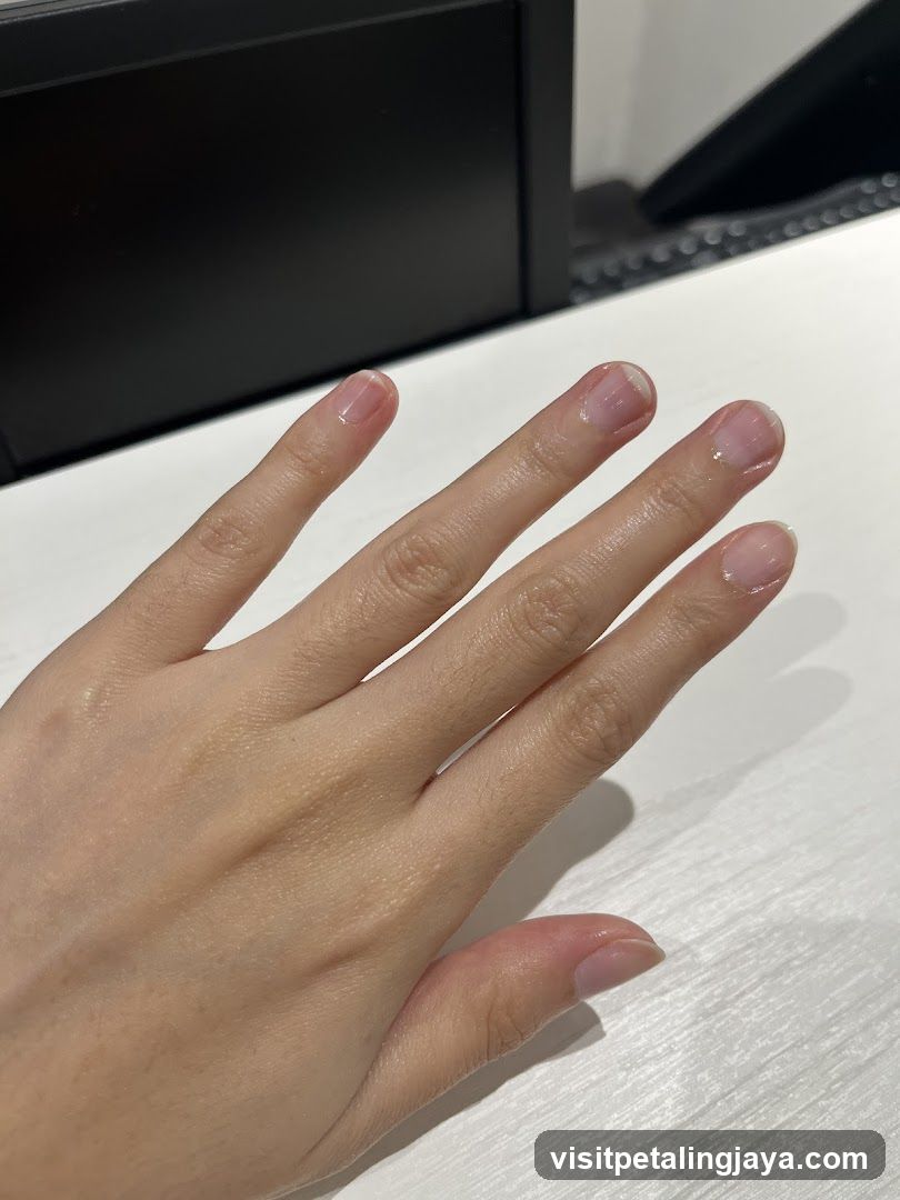 Hand with freshly manicured nails