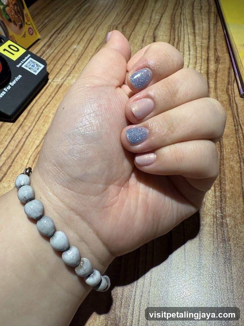 Manicured Hand with Bracelet