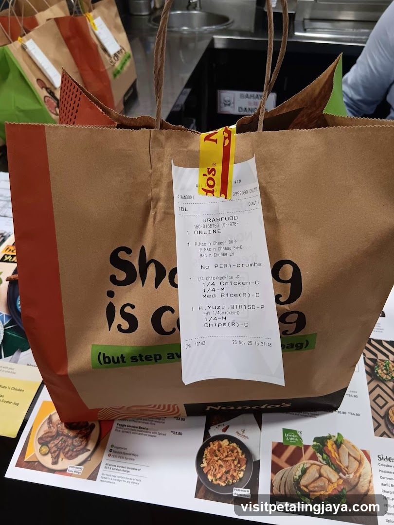 Nando's Takeaway Bag with Receipt and Menu Brochure