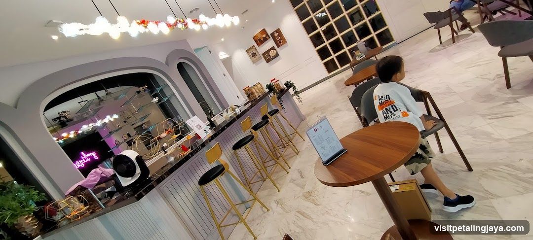 Modern Cafe Interior with Seating and Bar