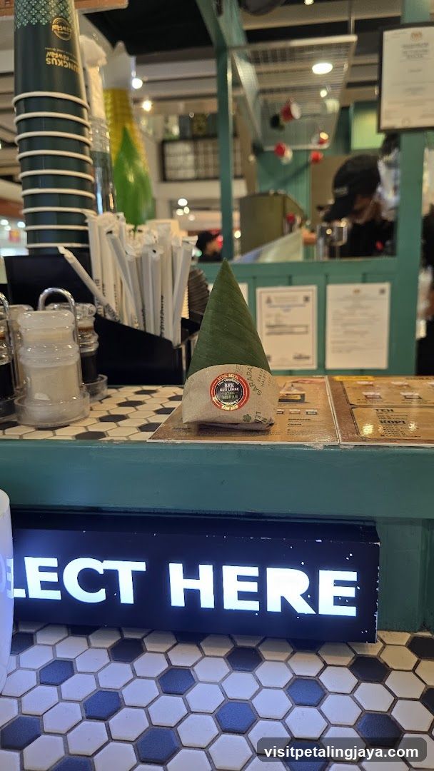 Food stall counter with Nasi Lemak and menu