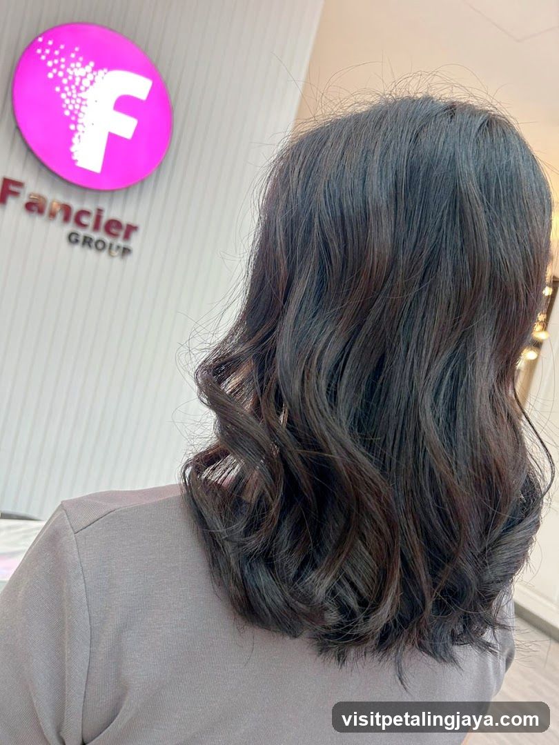 Woman with styled dark hair