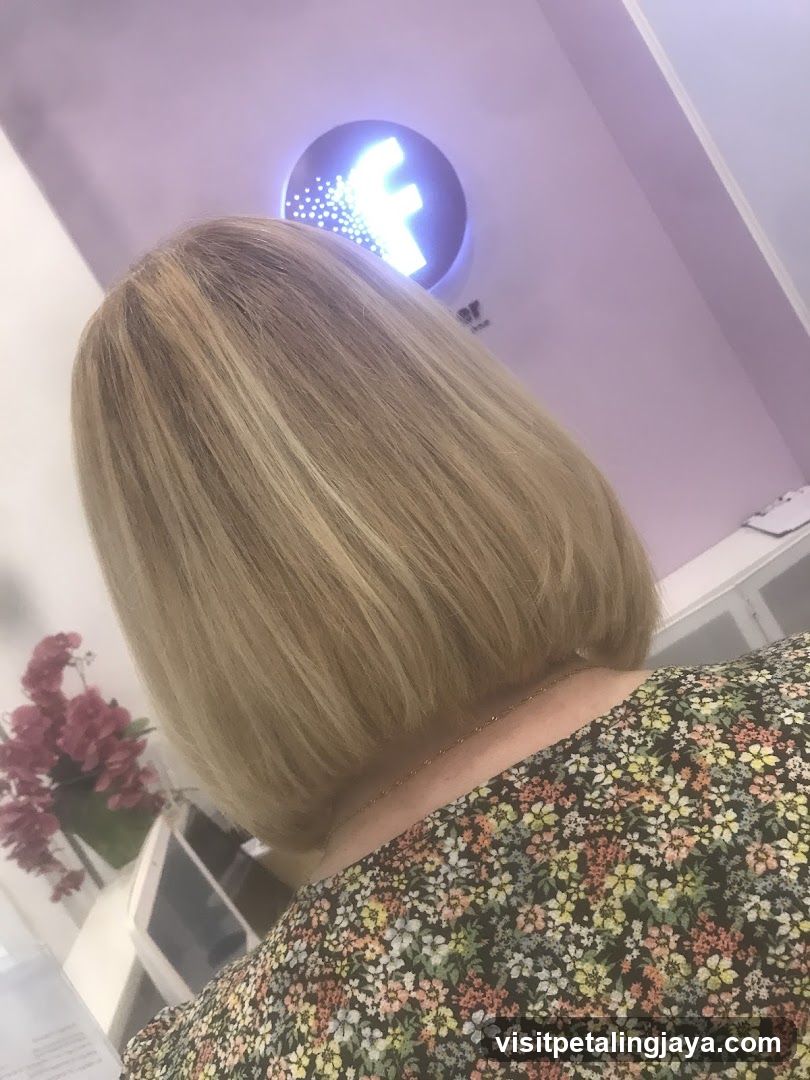 Woman with blonde bob haircut