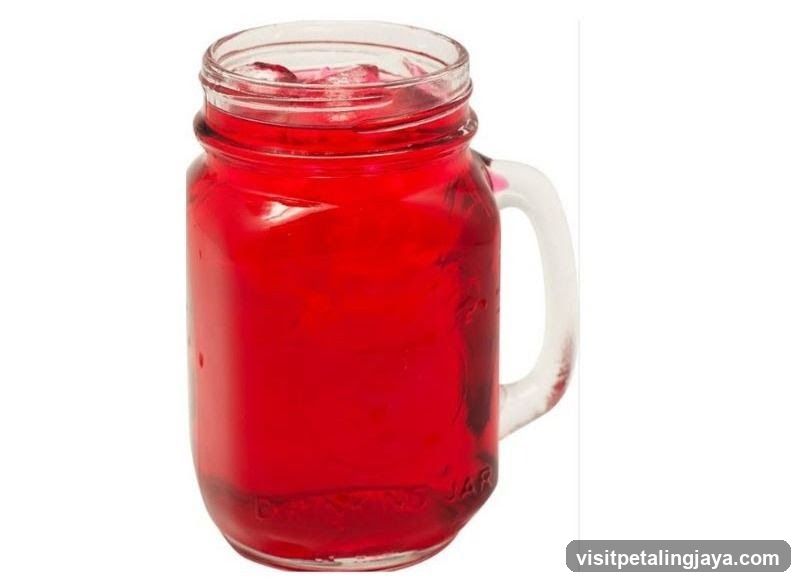 Red Drink in a Mason Jar