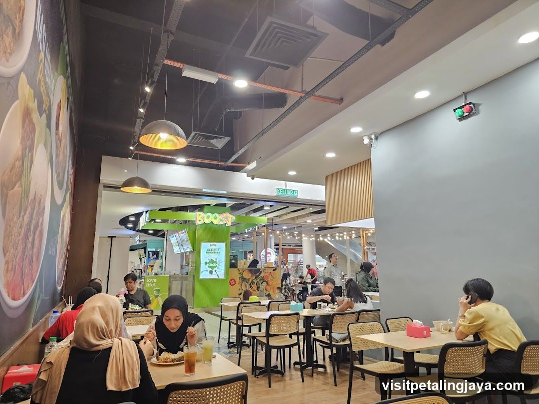 Indoor dining area with people eating