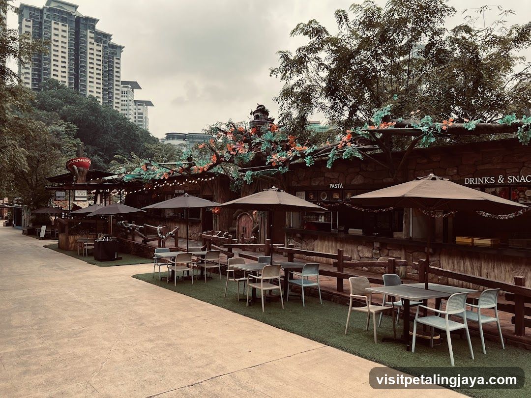 Outdoor dining area with rustic food stalls