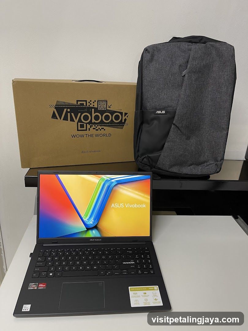 ASUS Vivobook Laptop with Backpack and Box