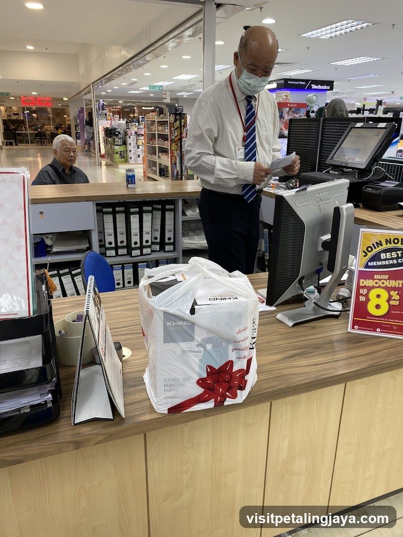 Store Counter with Staff and Promotional Sign