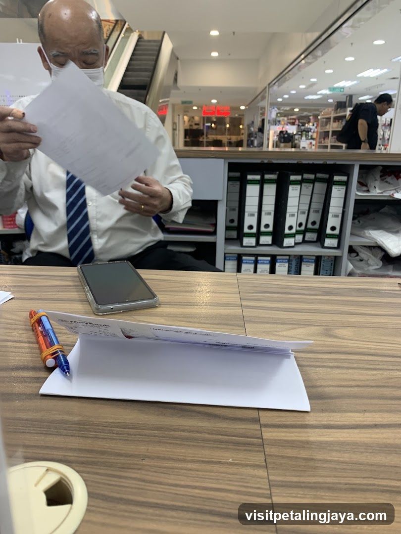 Man reviewing documents at a desk