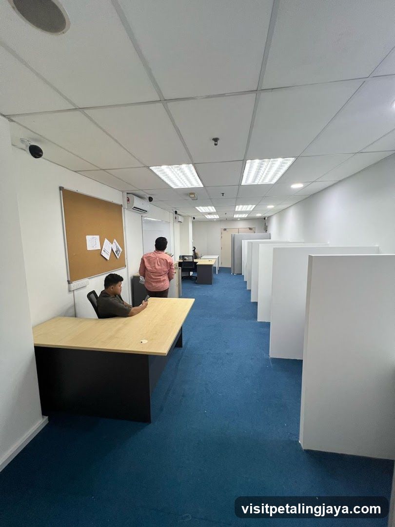 Office Interior with Cubicles and Staff