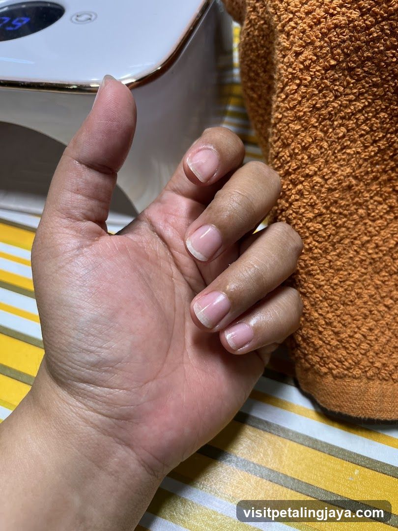 Hand with freshly manicured nails