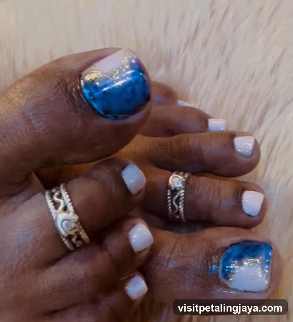 Pedicure with Blue and White Polish