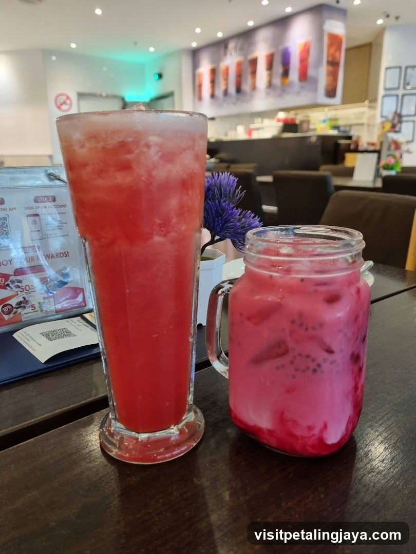Two colorful drinks on a table